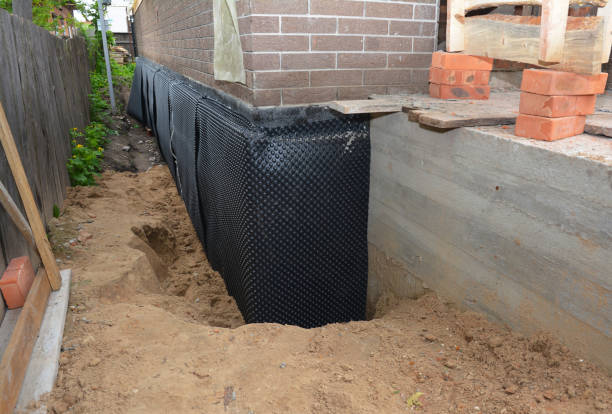 SJ Waterproofing Pros technician performing targeted Exterior Waterproofing assessment in Lupton City, TN